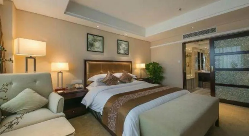 Bed in Maison New Century Hotel Ningbo