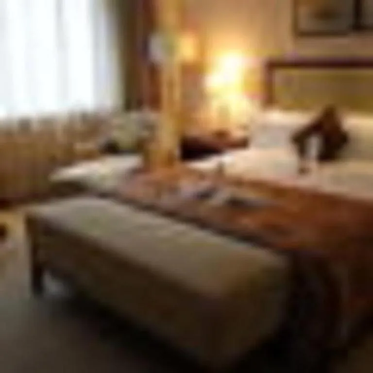 Bed in Maison New Century Hotel Ningbo