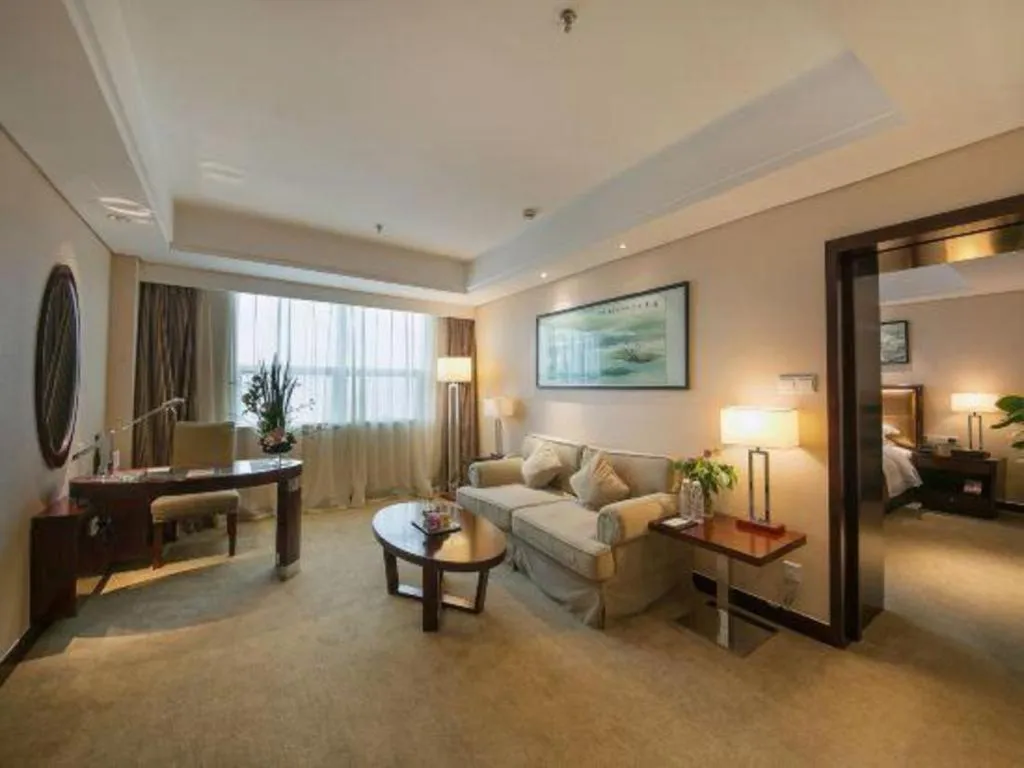 Bed in Maison New Century Hotel Ningbo