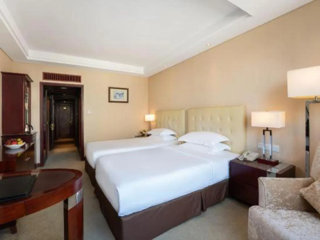 Bed in Maison New Century Hotel Ningbo