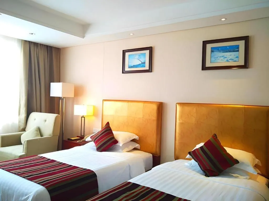 Bed in Maison New Century Hotel Ningbo