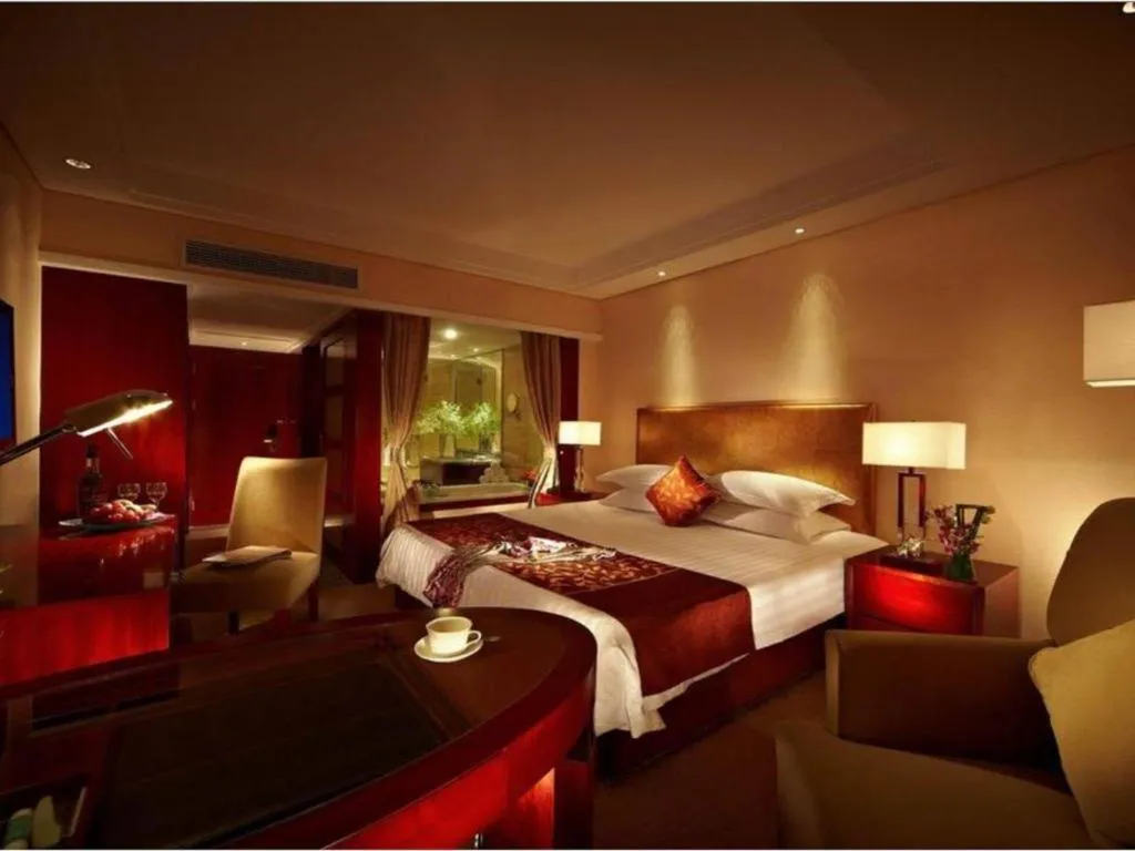 Bed in Maison New Century Hotel Ningbo