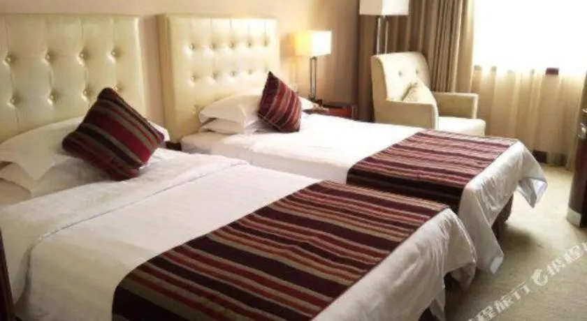 Bed in Maison New Century Hotel Ningbo