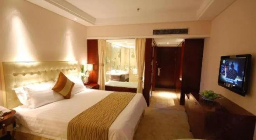 Bed in Maison New Century Hotel Ningbo