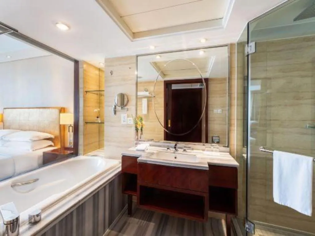 Bed in Maison New Century Hotel Ningbo