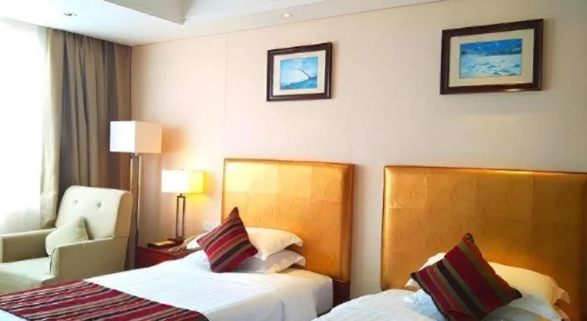 Bed in Maison New Century Hotel Ningbo