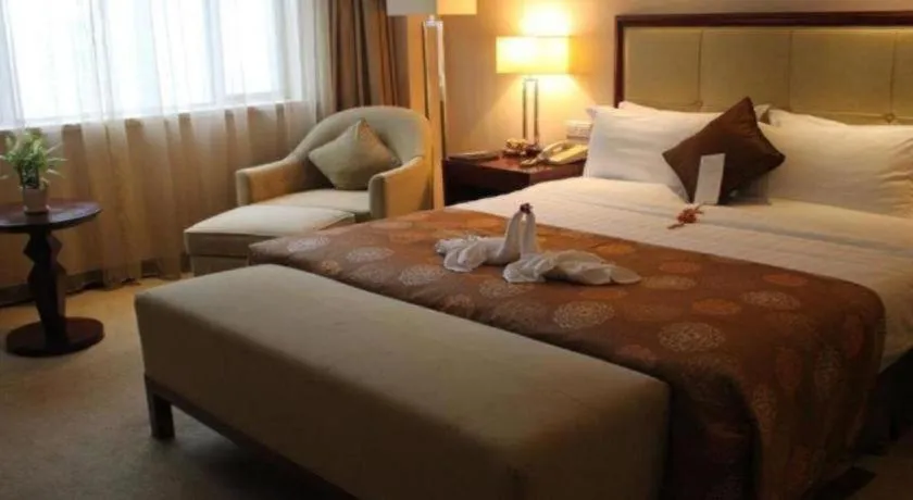 Bed in Maison New Century Hotel Ningbo