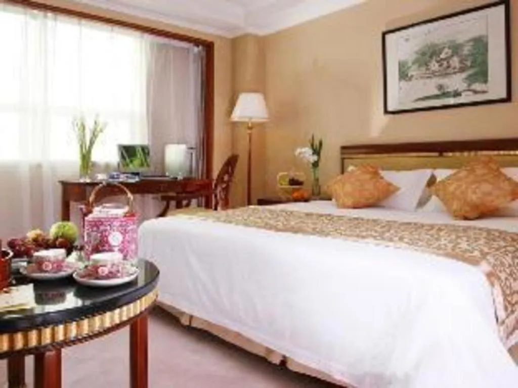 Bed in Maison New Century Hotel Ningbo