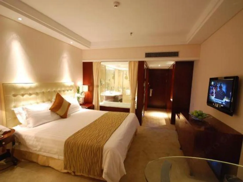 Bed in Maison New Century Hotel Ningbo