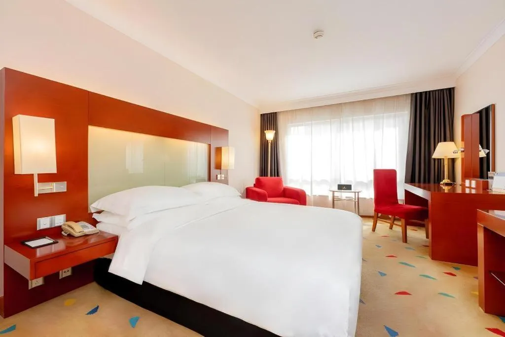 Bed in Grand Skylight Hotel Royal, Beijing