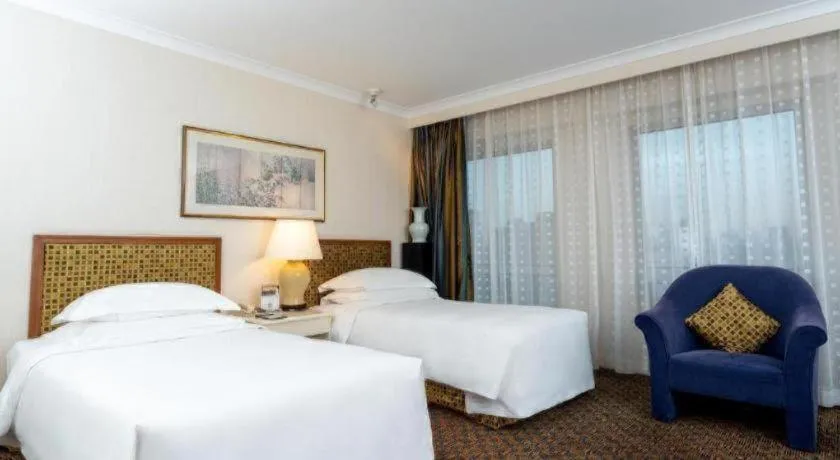 Bed in Grand Skylight Hotel Royal, Beijing