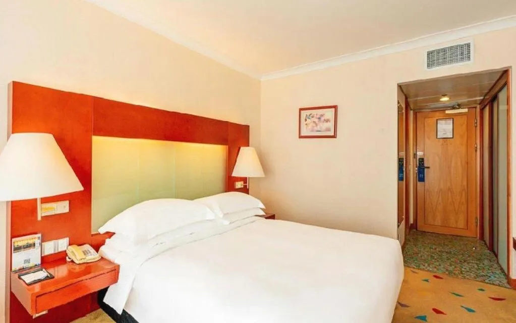 Bed in Grand Skylight Hotel Royal, Beijing