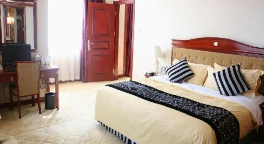 Bed in Xinhai Jinjiang Hotel