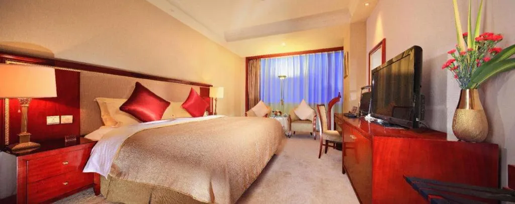 Bed in Xinhai Jinjiang Hotel