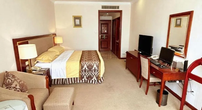 Bed in Xinhai Jinjiang Hotel