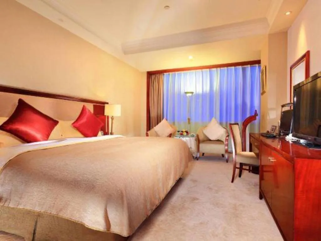 Bed in Xinhai Jinjiang Hotel