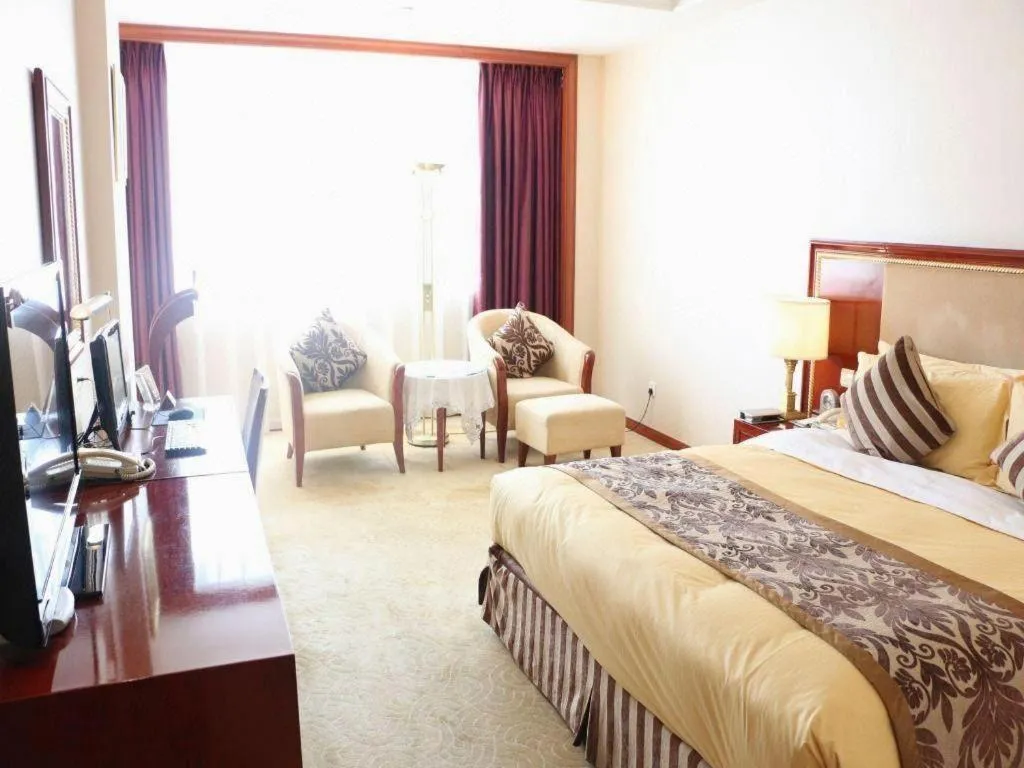 Bed in Xinhai Jinjiang Hotel