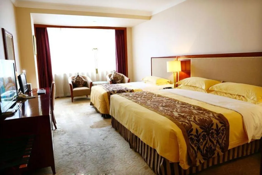 Bed in Xinhai Jinjiang Hotel