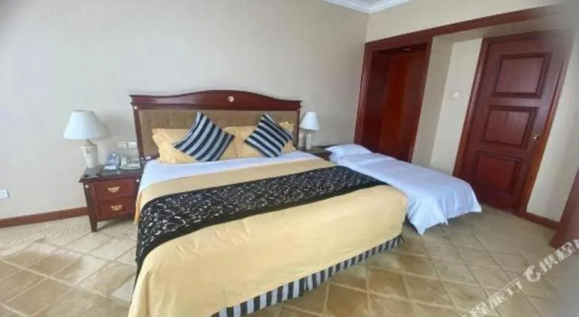 Bed in Xinhai Jinjiang Hotel