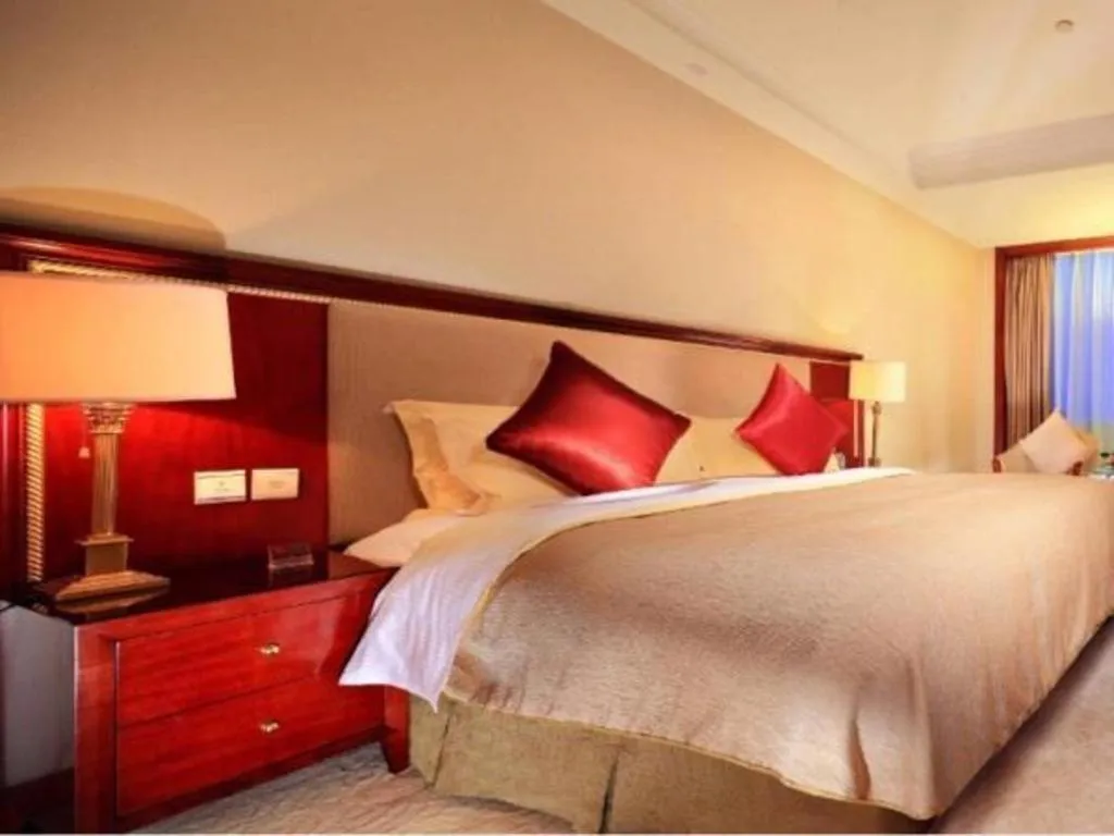 Bed in Xinhai Jinjiang Hotel