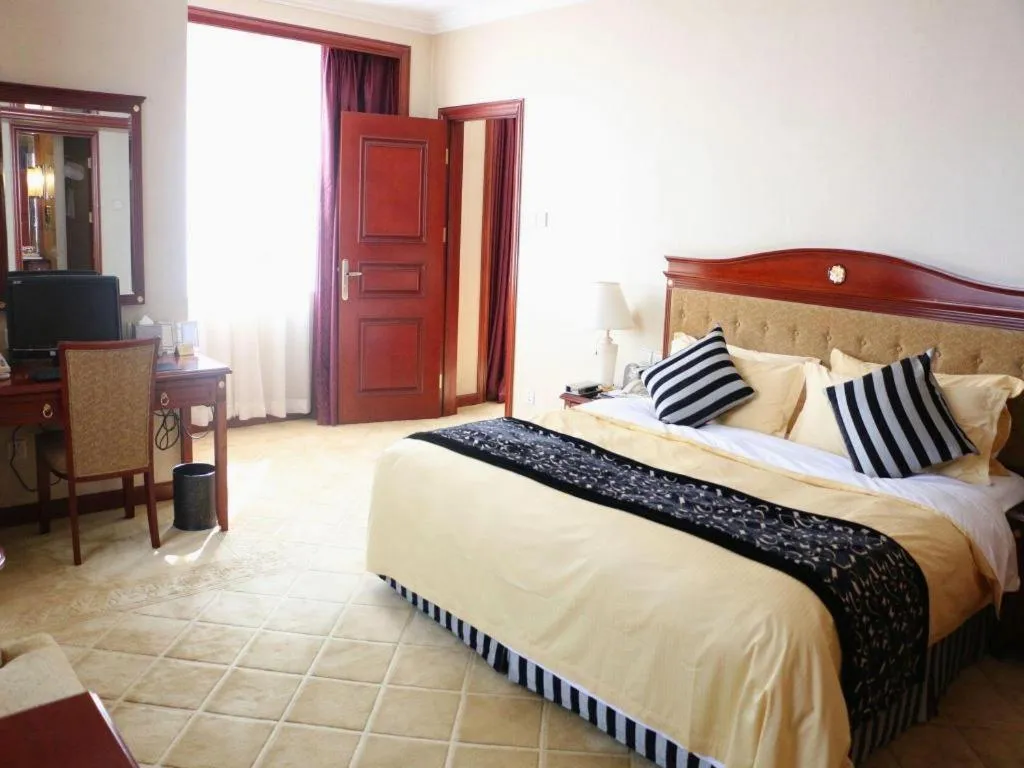 Bed in Xinhai Jinjiang Hotel