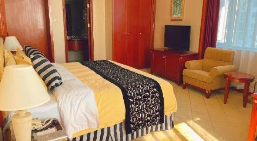 Bed in Xinhai Jinjiang Hotel