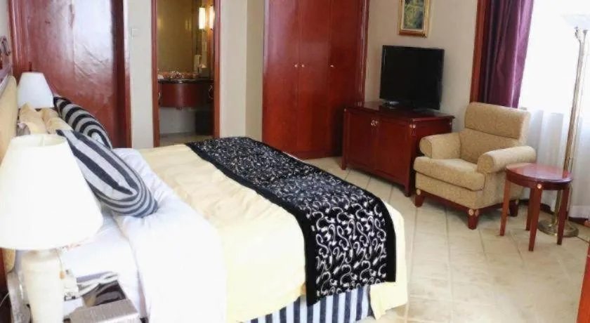 Bed in Xinhai Jinjiang Hotel