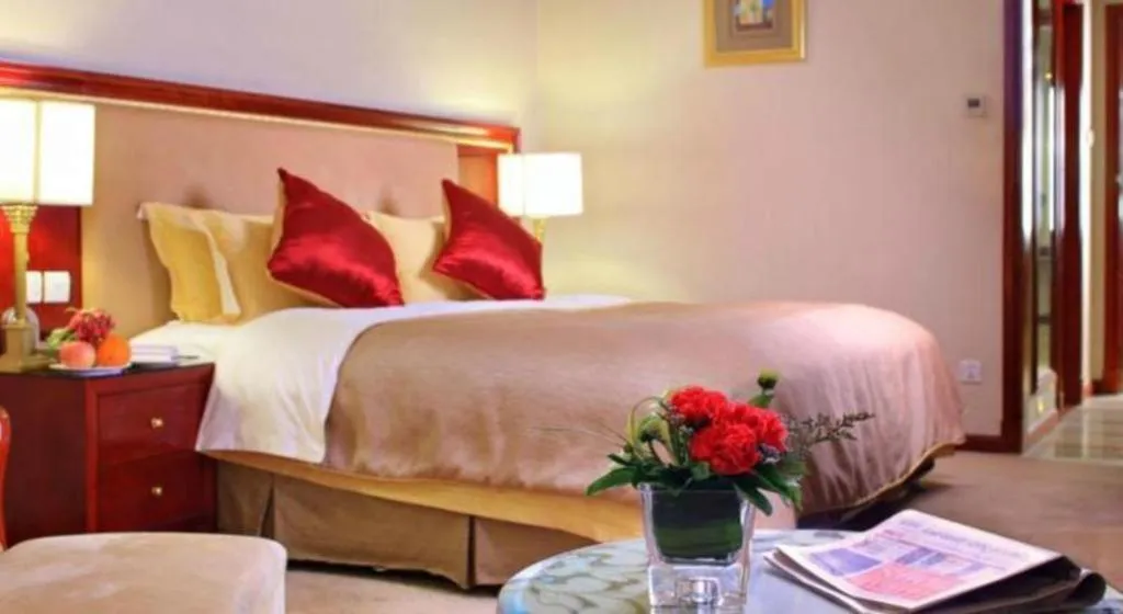 Bed in Xinhai Jinjiang Hotel