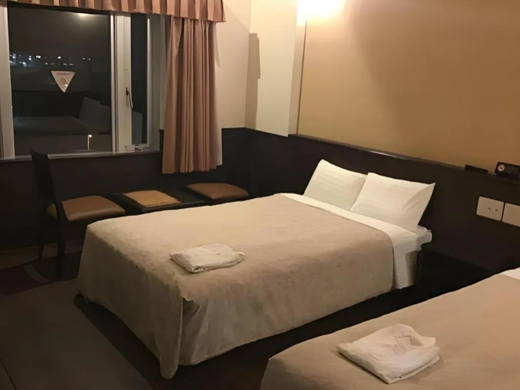 Bed in Hotel Gran View Okinawa