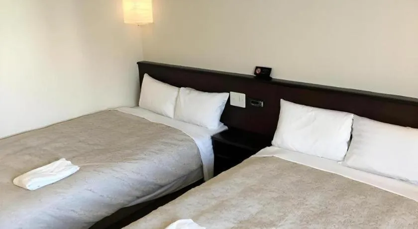 Bed in Hotel Gran View Okinawa