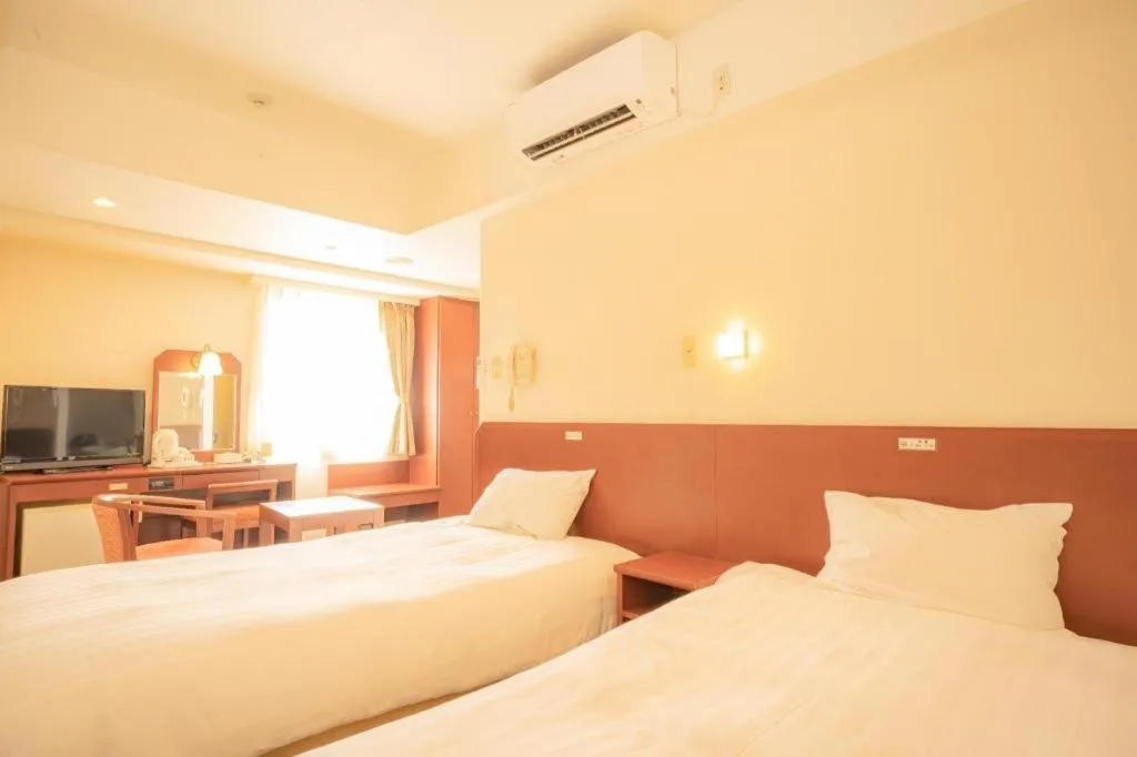 Bed in Smile Hotel Nishiakashi