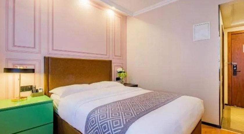 Bed in GME NanJing CaoChanGMEn Nanyihou Stress Hotel