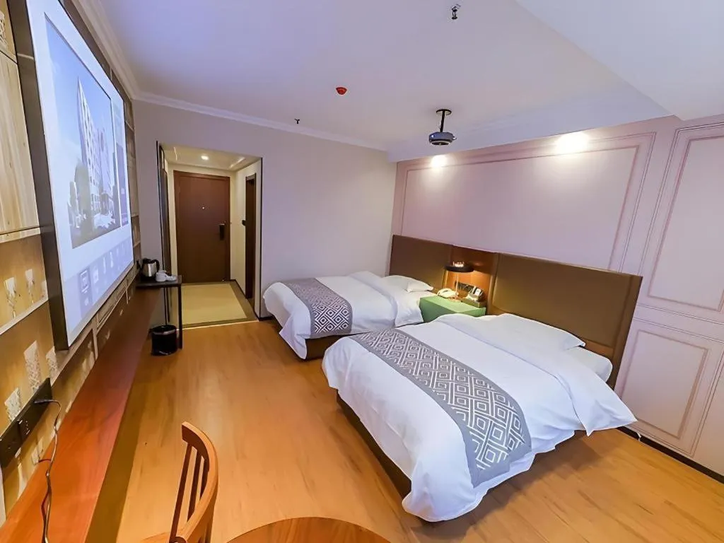 Bed in GME NanJing CaoChanGMEn Nanyihou Stress Hotel