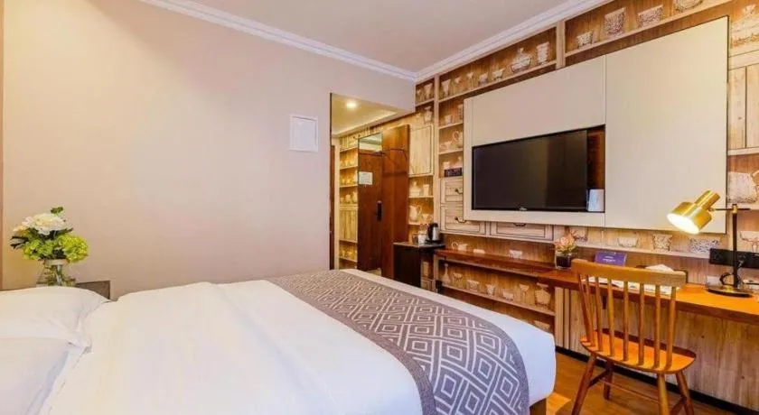 Bed in GME NanJing CaoChanGMEn Nanyihou Stress Hotel