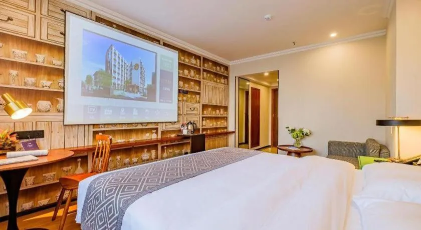 Bed in GME NanJing CaoChanGMEn Nanyihou Stress Hotel