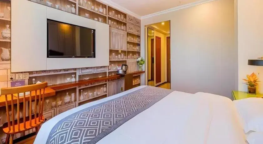 Bed in GME NanJing CaoChanGMEn Nanyihou Stress Hotel Bed in GME NanJing CaoChanGMEn Nanyihou Stress Hotel