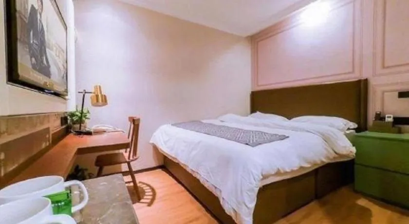 Bed in GME NanJing CaoChanGMEn Nanyihou Stress Hotel