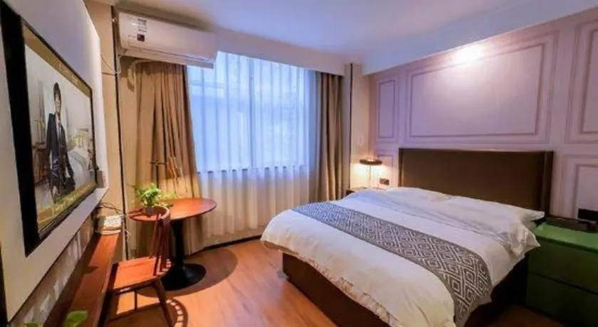 Bed in GME NanJing CaoChanGMEn Nanyihou Stress Hotel