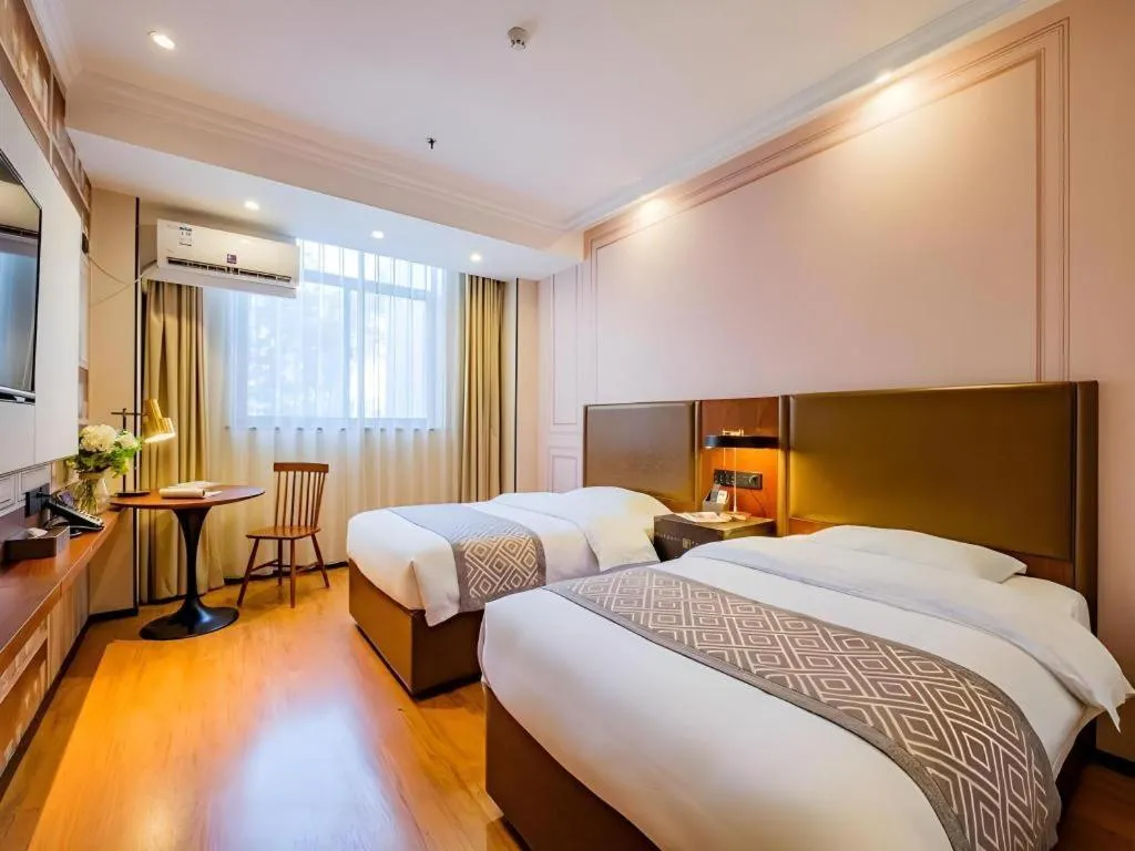 Bed in GME NanJing CaoChanGMEn Nanyihou Stress Hotel