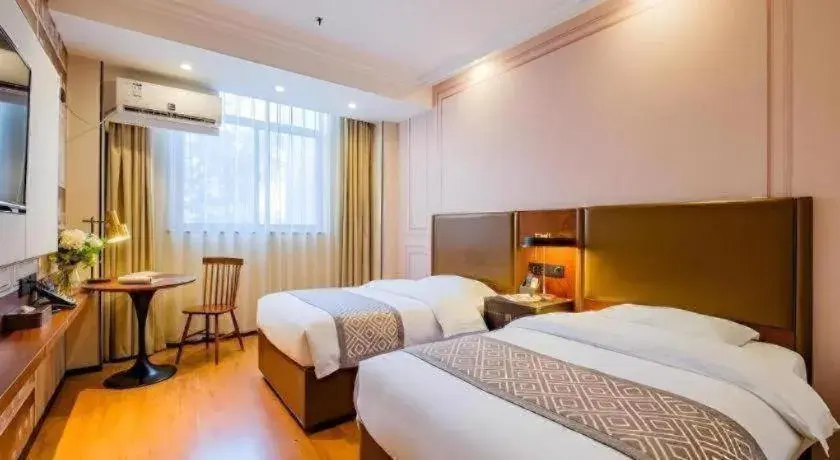 Bed in GME NanJing CaoChanGMEn Nanyihou Stress Hotel Bed in GME NanJing CaoChanGMEn Nanyihou Stress Hotel