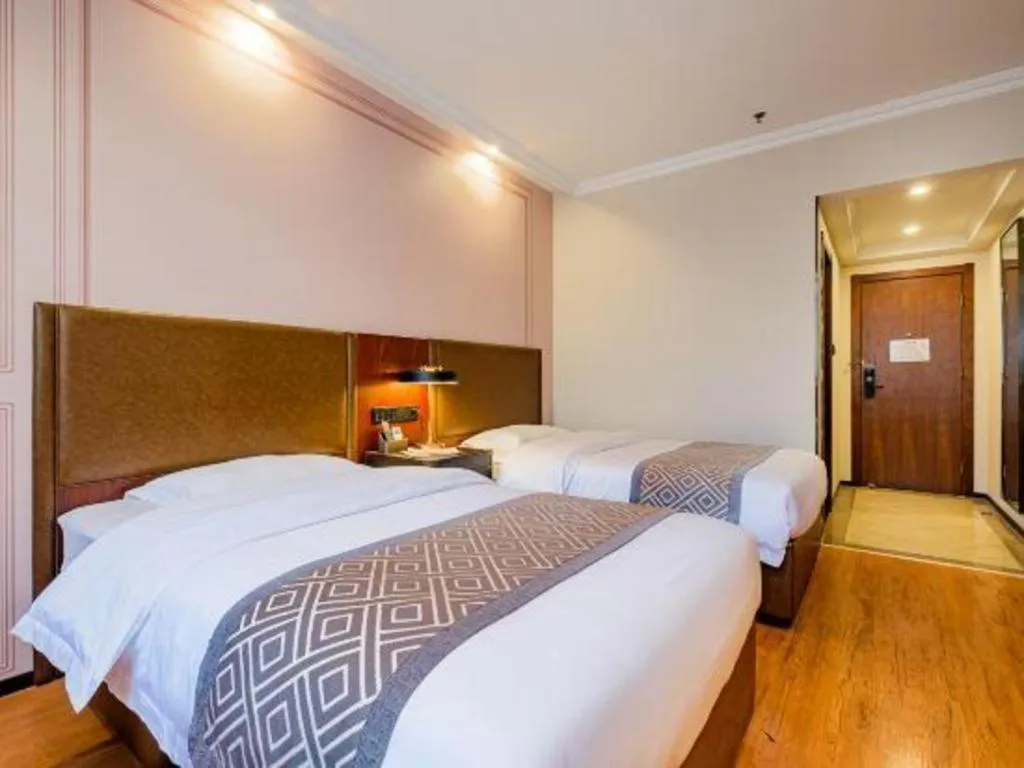 Bed in GME NanJing CaoChanGMEn Nanyihou Stress Hotel