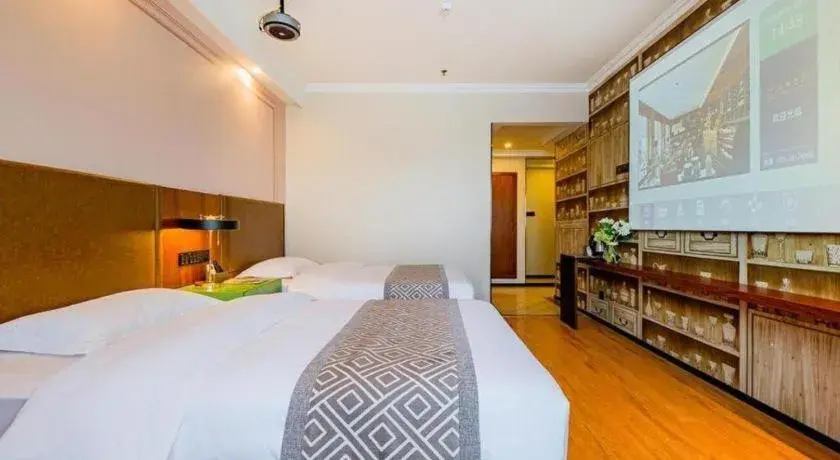 Bed in GME NanJing CaoChanGMEn Nanyihou Stress Hotel Bed in GME NanJing CaoChanGMEn Nanyihou Stress Hotel