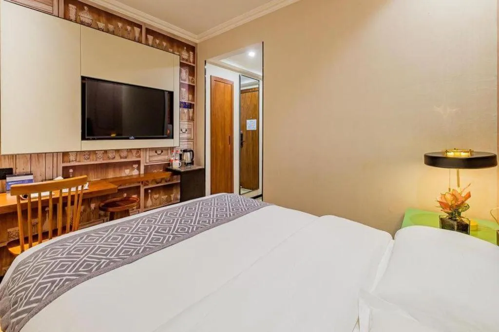 Bed in GME NanJing CaoChanGMEn Nanyihou Stress Hotel