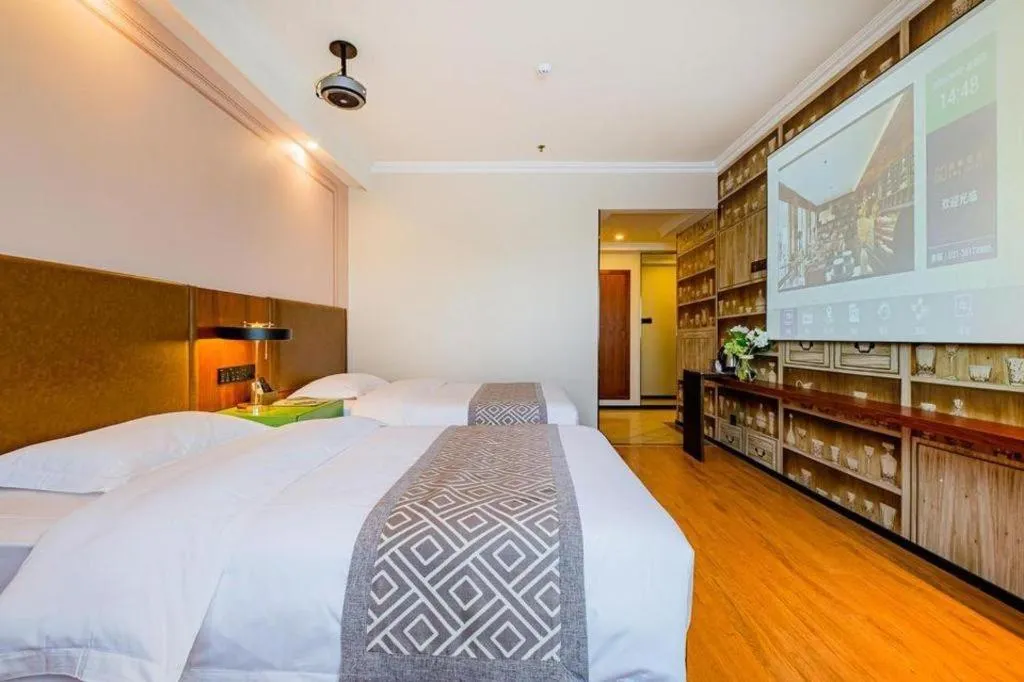 Bed in GME NanJing CaoChanGMEn Nanyihou Stress Hotel