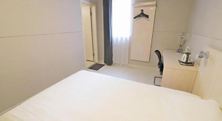 Bed in Jinjiang Inn Shanghai Minhang Zhuanqiao