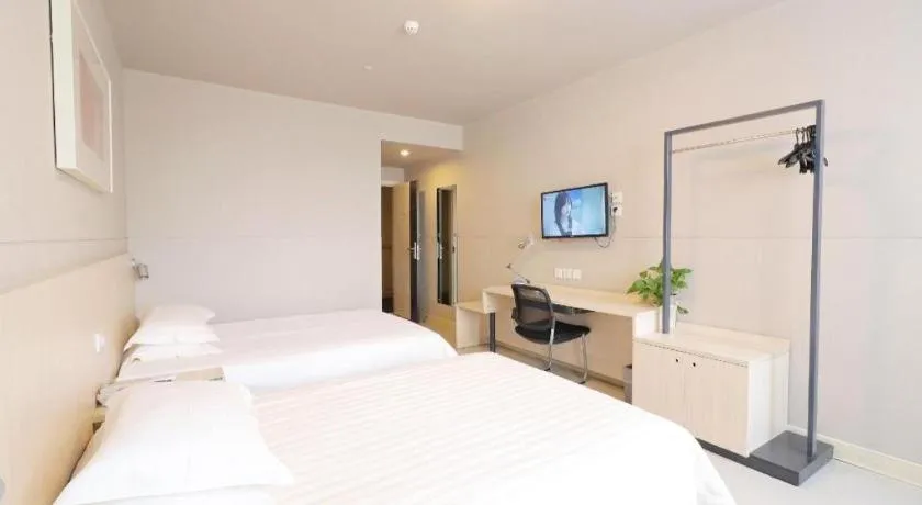 Bed in Jinjiang Inn Shanghai Minhang Zhuanqiao