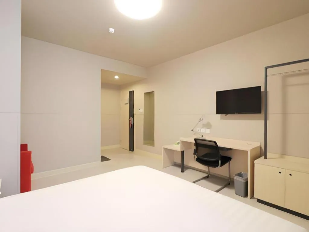 Bed in Jinjiang Inn Shanghai Minhang Zhuanqiao