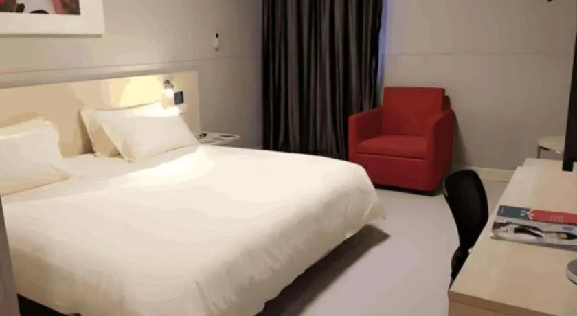 Bed in Jinjiang Inn Shanghai Minhang Zhuanqiao