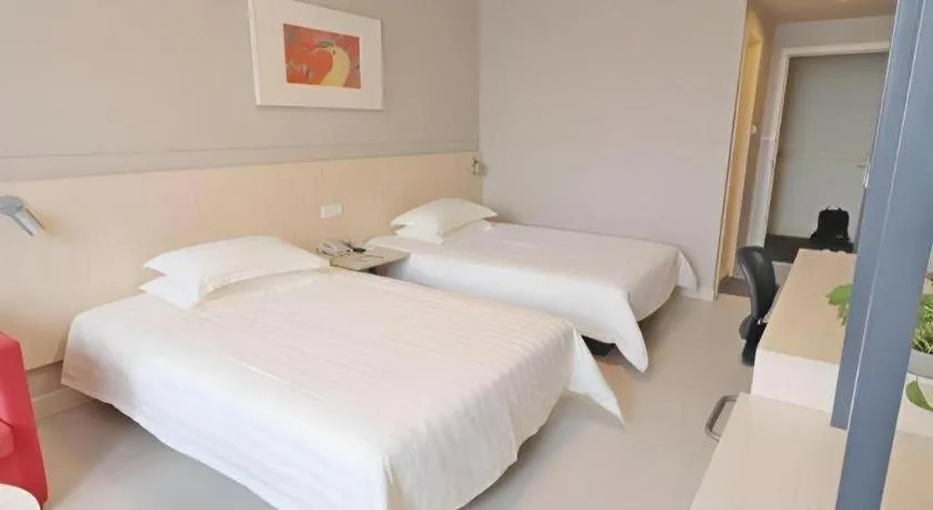 Bed in Jinjiang Inn Shanghai Minhang Zhuanqiao