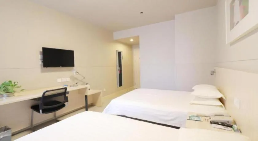 Bed in Jinjiang Inn Shanghai Minhang Zhuanqiao